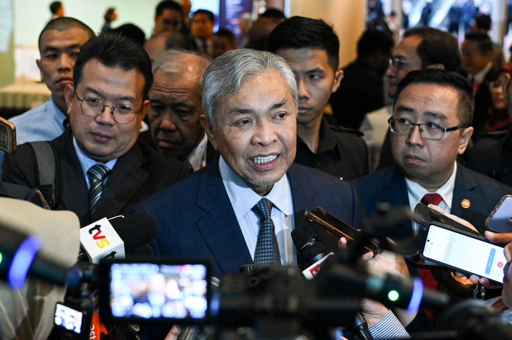 Deputy Prime Minister Datuk Seri Ahmad Zahid Hamidi speaks to reporters after attending the Cyberjaya Conversations Summit 2025 at the Kuala Lumpur Convention Centre, December 3, 2025. — Bernama pic 
