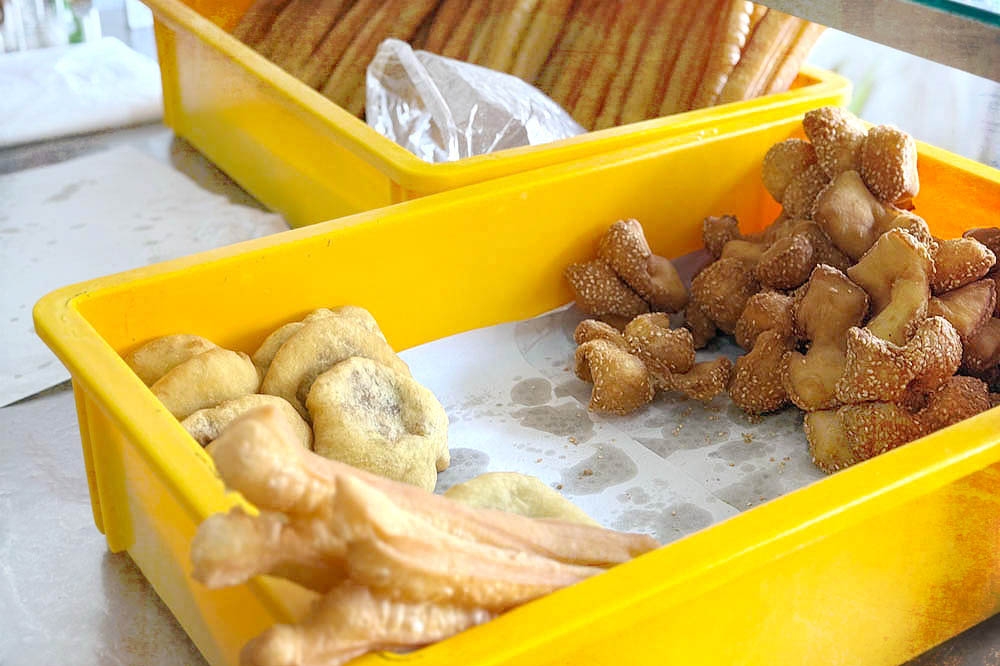 Freshly fried ‘yao char kwai’, ‘ma geok’ and ‘ham chim peng’. — Picture by CK Lim