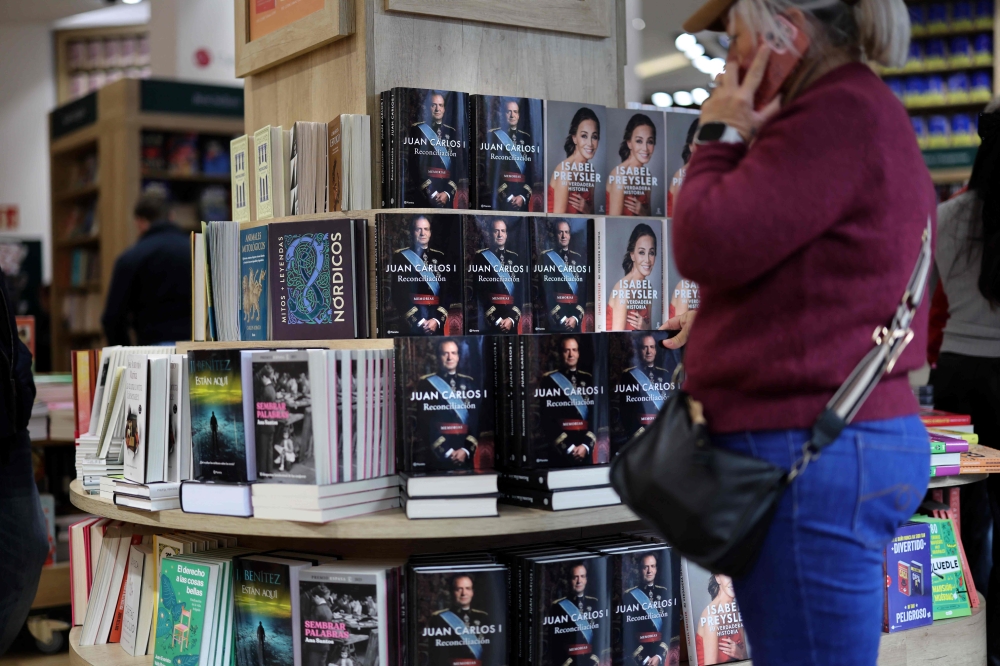 Former king Juan Carlos’ memoirs hit Spanish bookstores, warm words for Franco ignite controversy