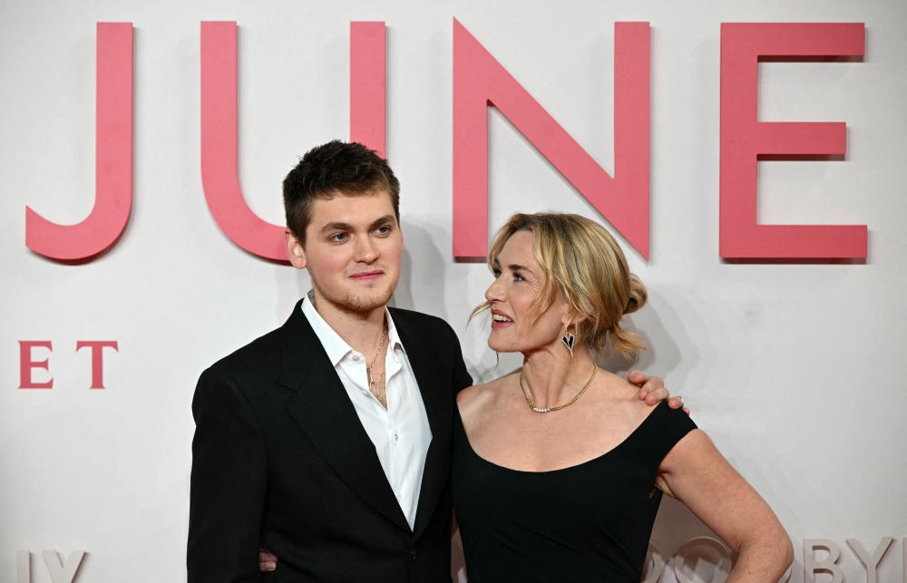 US-English actor and writer Joe Anders poses with his mother British actress Kate Winslet on the red carpet upon arrival to attend the world premiere of the film  ‘Goodbye June’, the directorial debut of British actress Kate Winslet, in central London on December 3, 2025. — AFP pic 