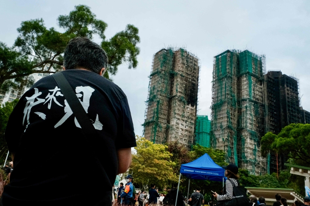 Hong Kong authorities have faulted mesh netting for the deadly fire at the Wang Fuk Court apartments on November 26, 2025 that killed over 150 people so far. — AFP pic
