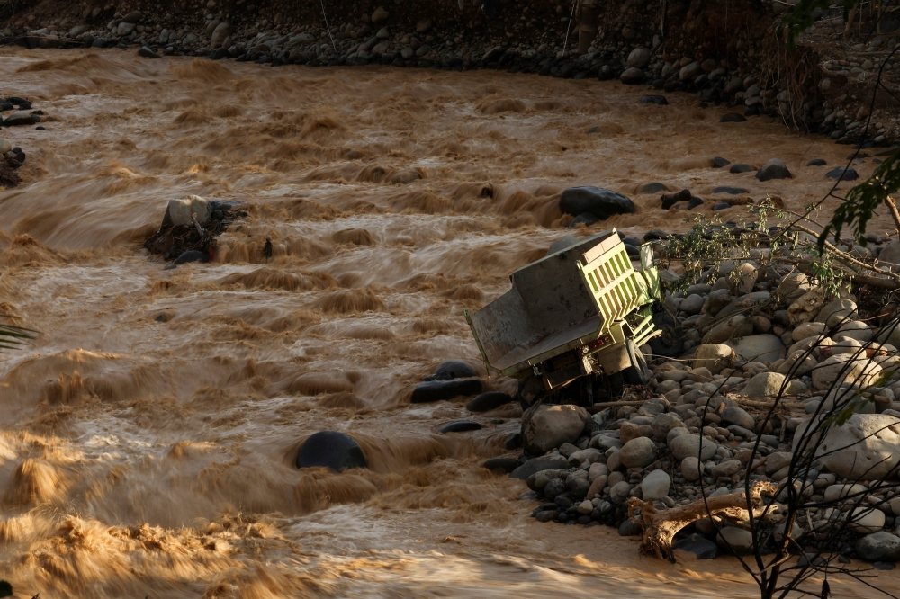 Indonesia weighs mining curbs after 800 die in Sumatra floods as deforestation row flares