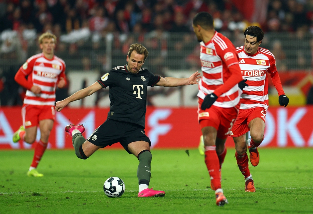 Bayern Munich’s Harry Kane in action with Union Berlin’s Danilho Doekhi and Diogo Leite in Berlin, December 3, 2025. — Reuters pic