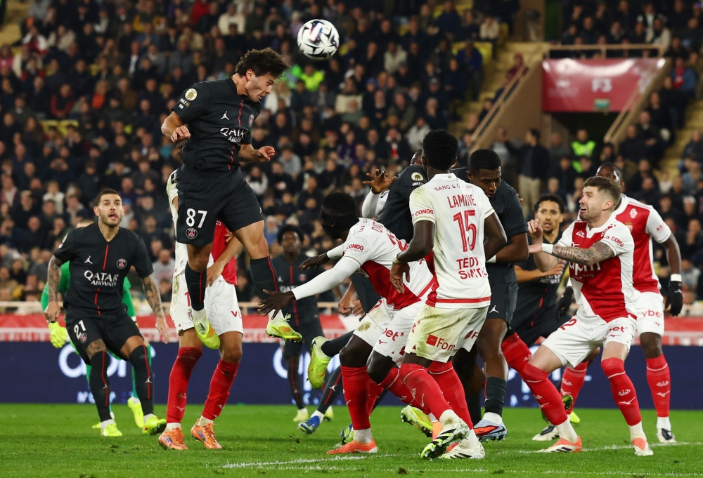 Paris St Germain’s João Neves heads at goal during a Ligue 1 match at Stade Louis II, Monaco, November 29, 2025. — Reuters pic