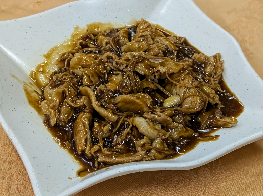 Pork belly stir-fried with ginger, though if you ask me, the ratio is more like ginger stir-fried with pork belly. — Picture by Ethan Lau