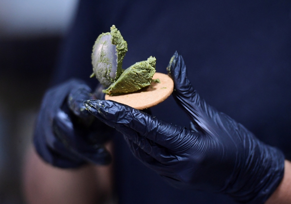 A worker of Tres Cumbres prepares a pistachio ‘alfajor’, a traditional Argentine cookie, at the Tres Cumbres factory in San Juan, Argentina, November 18, 2025. — Reuters pic 