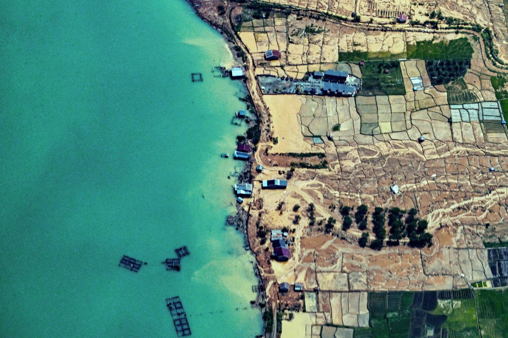 A residential area is seen damaged after flash floods in Bener Meriah district, Aceh province on December 4, 2025. — AFP pic