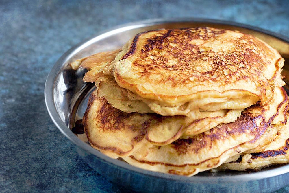 Stack the pancakes as you finish cooking them. — Picture by CK Lim