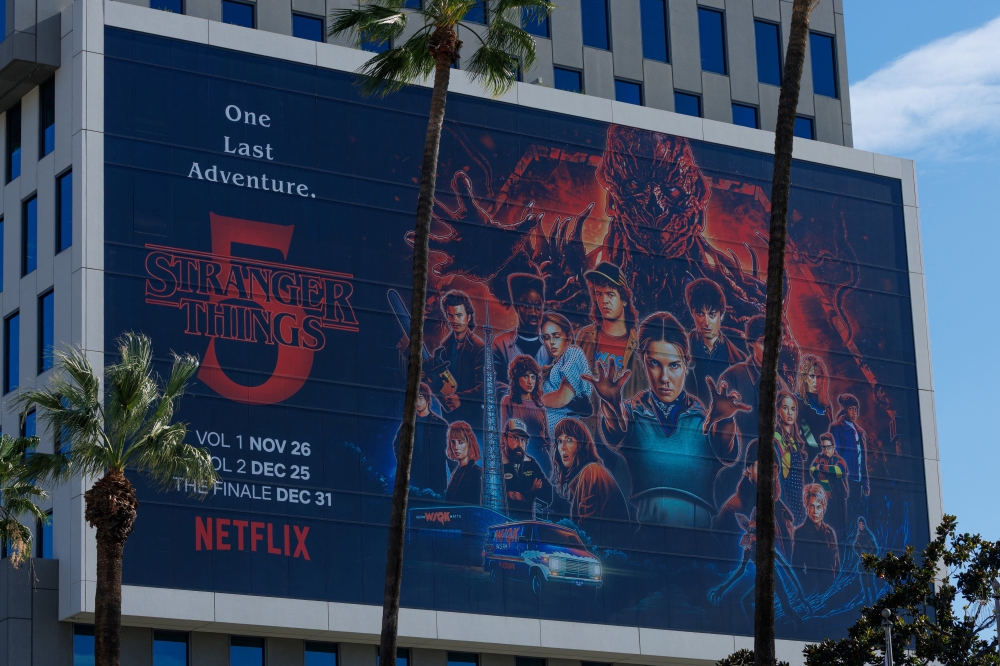 The Netflix logo alongside a ‘Stranger Things 5’ advertisement displayed on one of the company’s buildings in Los Angeles. — Reuters pic