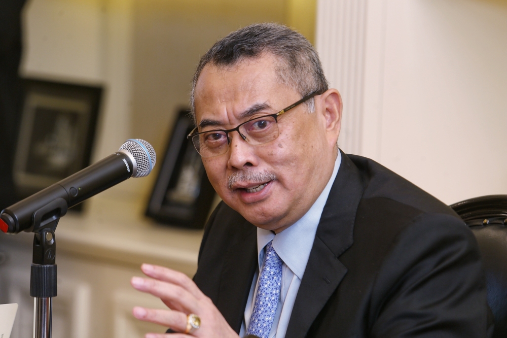 Chief Justice Datuk Wan Ahmad Farid Wan Salleh speaks to media, marking his first 100 days in office as the 17th Chief Justice, in Putrajaya yesterday. — Picture by Choo Choy May