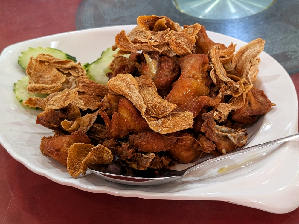 Ginger fried chicken, with super thin bits of ginger fried to a crisp. — Picture by Ethan Lau