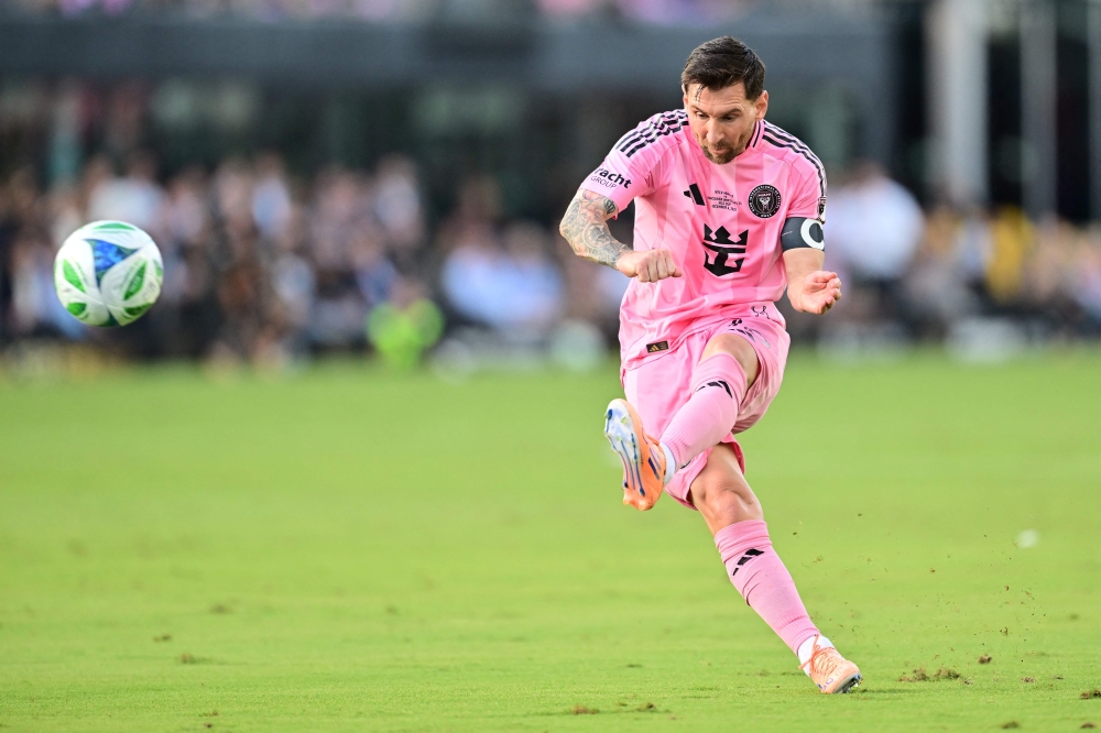 Lionel Messi inspired Inter Miami to their first ever MLS Cup title on Saturday, playing a starring role in a 3-1 victory over the Vancouver Whitecaps in Florida. — AFP pic