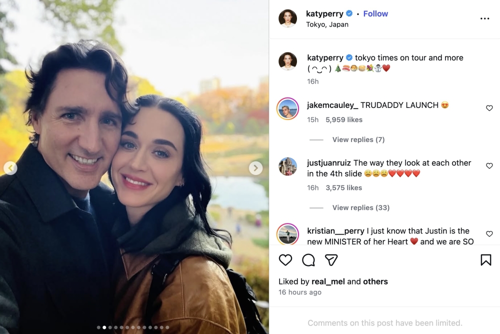 Katy Perry shared a series of photos from her Lifetimes Tour stop in Japan, including a selfie of the pair cuddled beneath autumn foliage. — Picture via Instagram