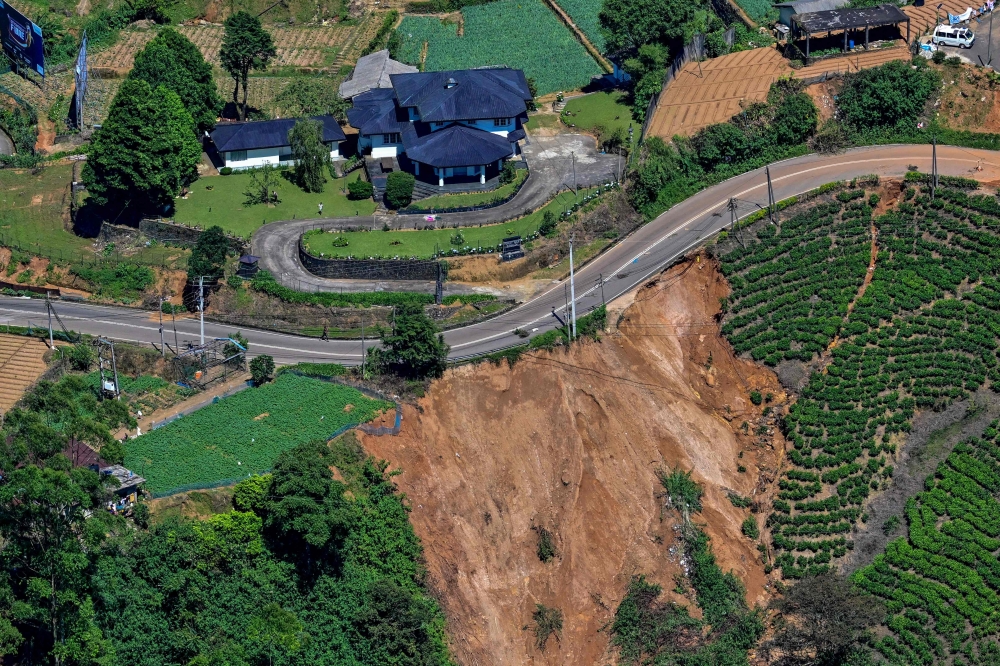An aerial view shows a washed-out tea estate at the site of a landslide in Nuwara Eliya, 100 kilometres east of Colombo, on December 2, 2025. — AFPpic