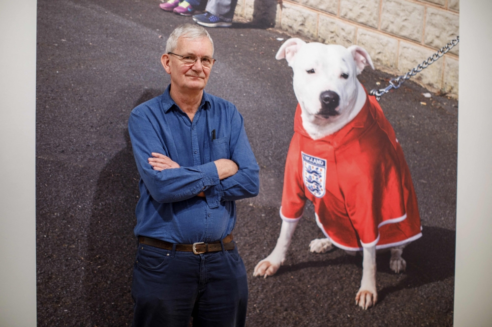 British photographer Martin Parr poses during the press preview of his Only Human: Photographs exhibition at the National Portrait Gallery in London on March 6, 2019. — AFP pic