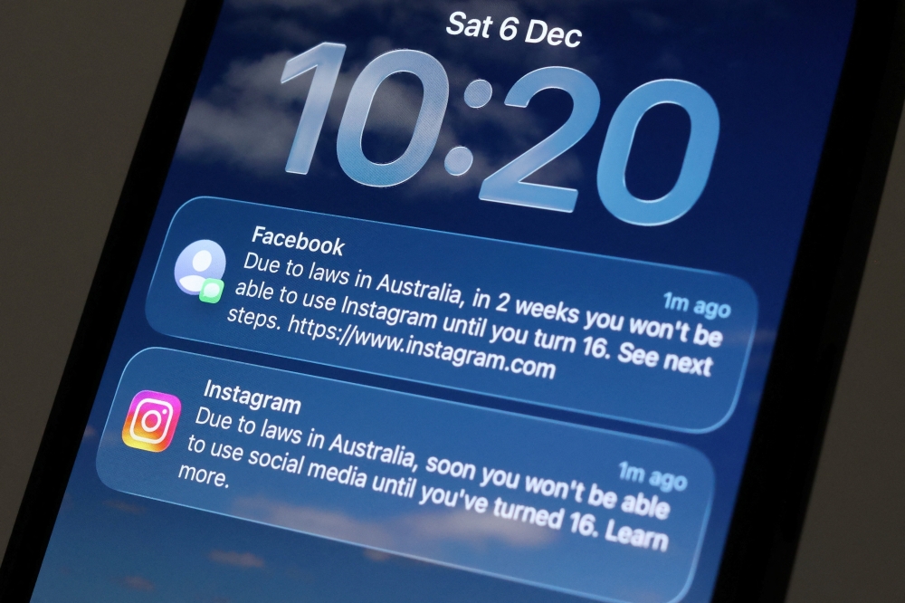 Facebook and Instagram alerts are displayed on a mobile phone as Meta prepares for a new law banning social media for users under 16 in Australia, in this picture illustration taken on December 6, 2025. — Reuters pic 