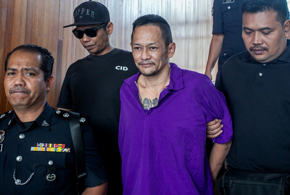 Lin Chee Ming, 49, was charged at the Magistrate’s Court here today over the murder of an elderly man at a house in Kampung Koh last month. — Bernama pic