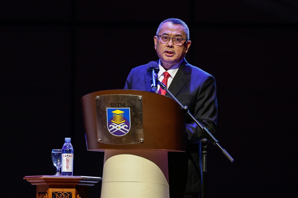 Chief Justice Datuk Seri Wan Ahmad Farid Wan Salleh delivers his address at the Chief Justice’s Premier Lecture organised by UiTM’s Faculty of Law at Dewan Konsert Seri Budiman, UiTM Shah Alam December 9, 2025. — Bernama pic