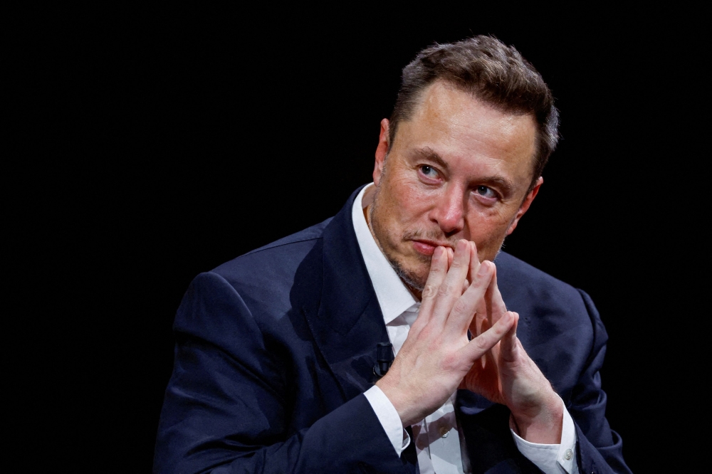 Formerly known as Twitter, Elon Musk's X was the last of 10 restricted social media platforms to set out how it will implement Australia’s ban. — Reuters pic