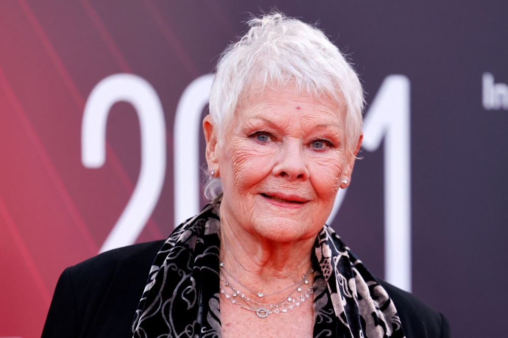 British actor Judi Dench poses on the red carpet on arrival to attend the European premiere of the film ‘Belfast’ during the 2021 BFI London Film Festival in London on October 12, 2021. — AFP pic