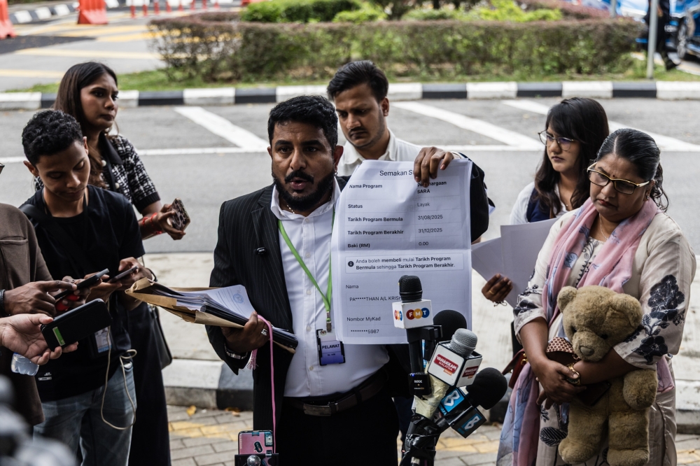 Social activist and Indira Gandhi Action Team (Ingat) chairman Arun Dorasamy speaks during a press conference on Indira Gandhi meeting with IGP Tan Sri Mohd Khalid Ismail at the Bukit Aman police headquarters in Kuala Lumpur December 10, 2025. — Picture by Firdaus Latif
