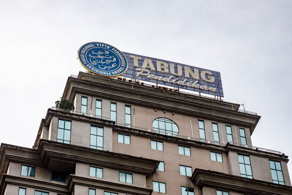 The author argues that PTPTN no longer functions as a real loan system because repayment rates are so poor. — Picture by Firdaus Latif