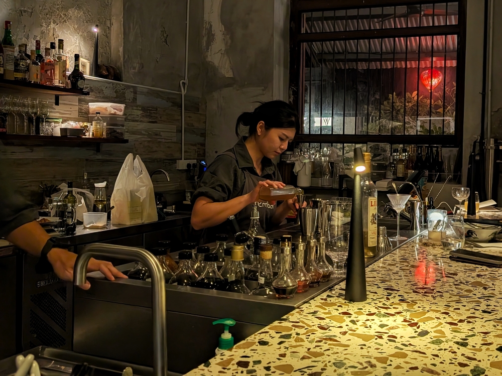 Overseeing the bar and drinks is Leung’s wife, Lee She Wei. — Picture by Ethan Lau