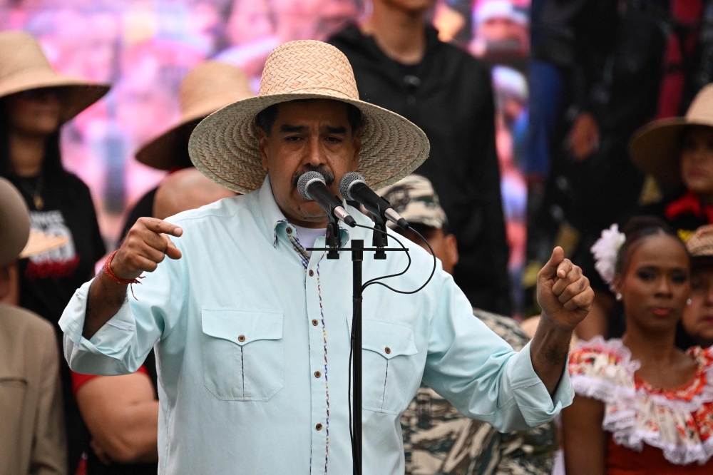Venezuela's President Nicolas Maduro speaks to his supporters during a rally to mark the anniversary of the Battle of Santa Ines, in Caracas on December 10, 2025. — AFP pic 