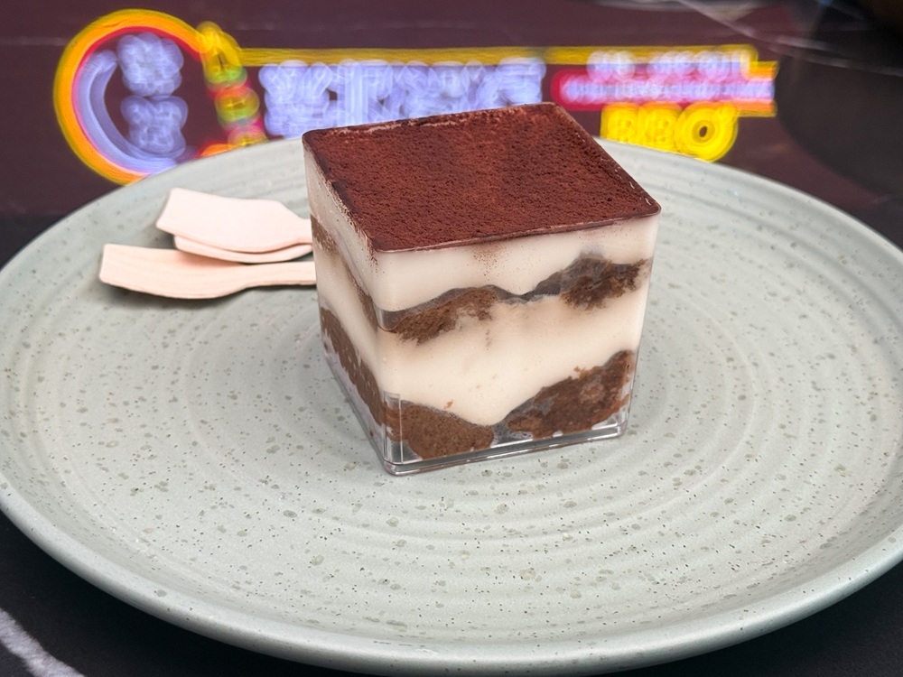Tiny tiramisu packed with boozy Myers rum and layers of mascarpone and sponge makes a nice after-meal treat. — Picture by Lee Khang Yi