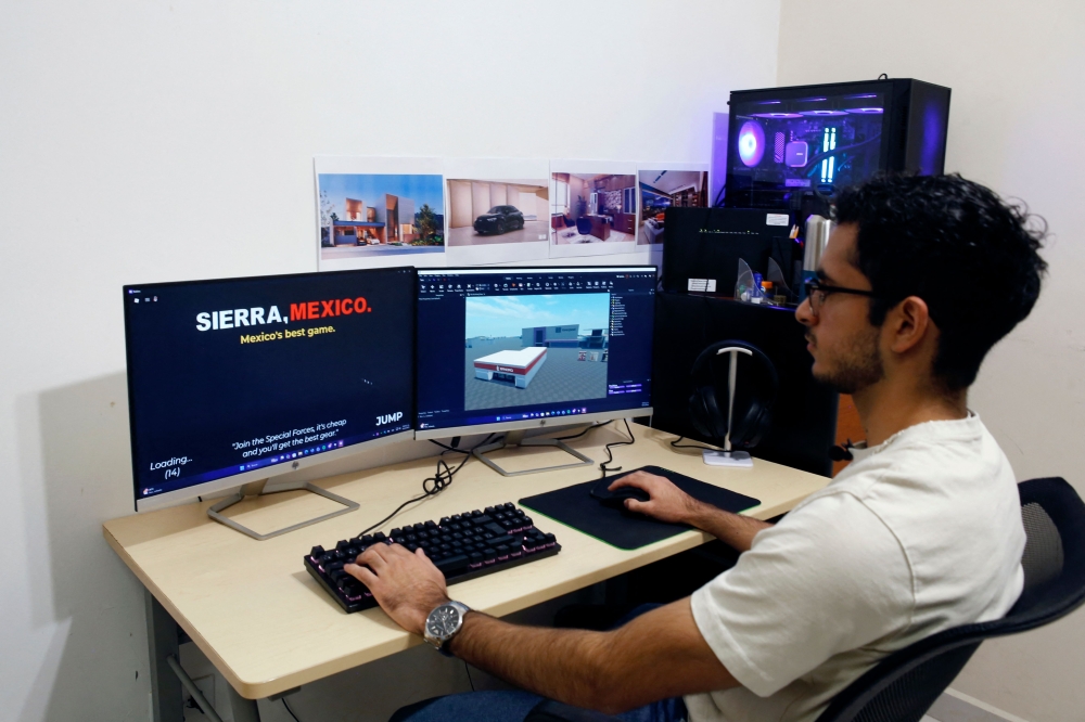Angel Villaverde, a technology engineering student, develops war-themed games for the Roblox gaming platform in Monterrey, Nuevo Leon State, Mexico November 19, 2025. These video games, with thousands of daily users, are part of what is known as ‘narco-culture,’ a phenomenon that is growing in Mexico and is also reflected in music, movies and fashion that glorify criminal life. — AFP pic 
