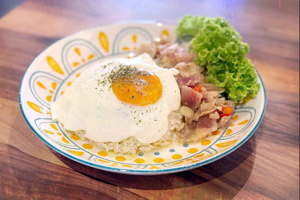‘Cincaluk’ pork with rice and fried egg. — Picture by CK Lim