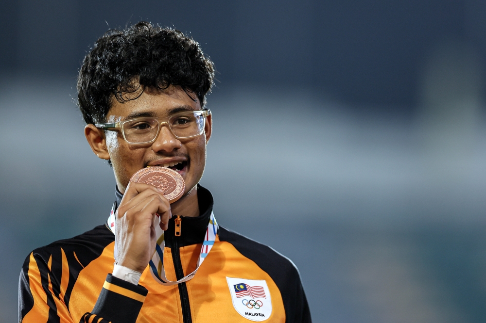 Fast rising national sprint talent Danish Iftikhar Muhammad Roslee bagged a bronze medal in the men’s 200 metres final at the 33rd SEA Games last night, marking another podium finish in his debut. — Bernama pic