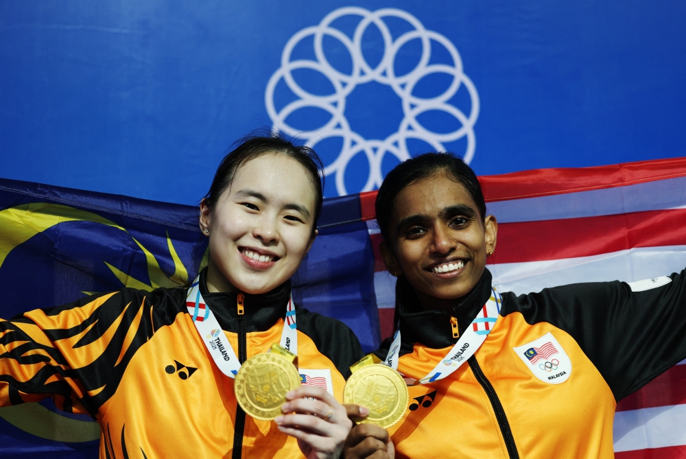 Malaysia secured its first badminton gold of the SEA Games today after national women’s doubles pair Pearly Tan and M Thinaah triumphed in Bangkok. — Reuters pic