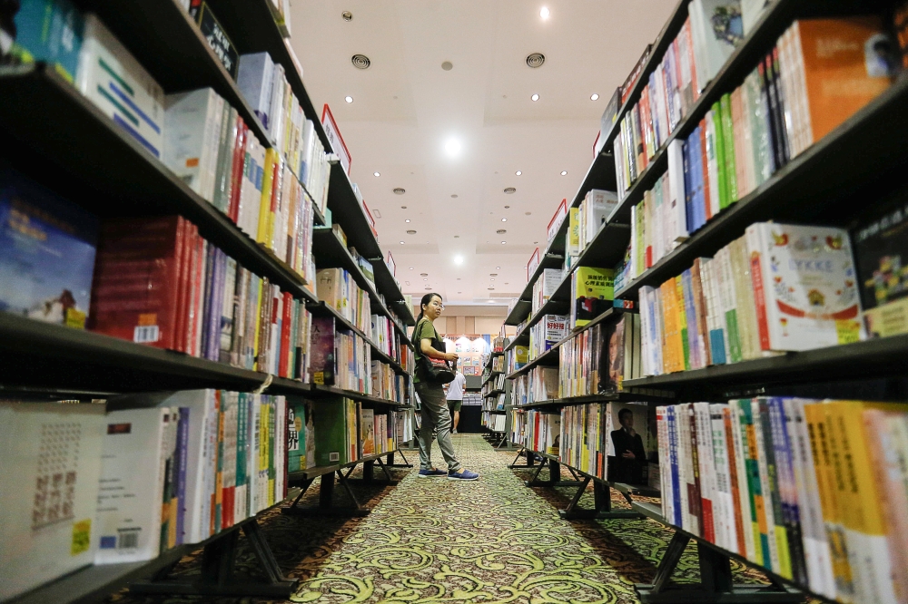 Visitors view books at the Straits Quay Convention Centre in Penang on November 28, 2019. — Picture by Sayuti Zainudin