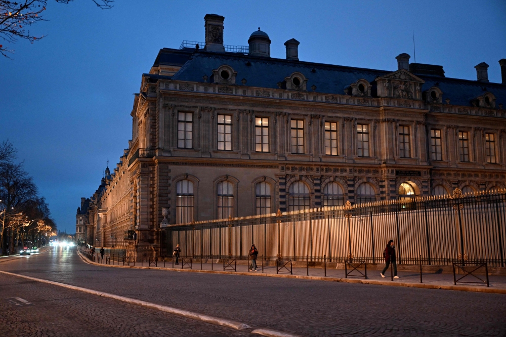 Overcrowding, leaks and lax security: Louvre workers walk out after $102m robbery at Paris museum