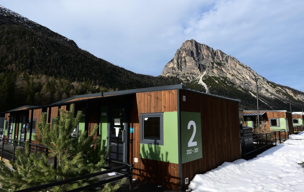 Italy unveils €38m alpine glamping experiment, housing 1,400 Winter Olympics athletes in snowy Cortina