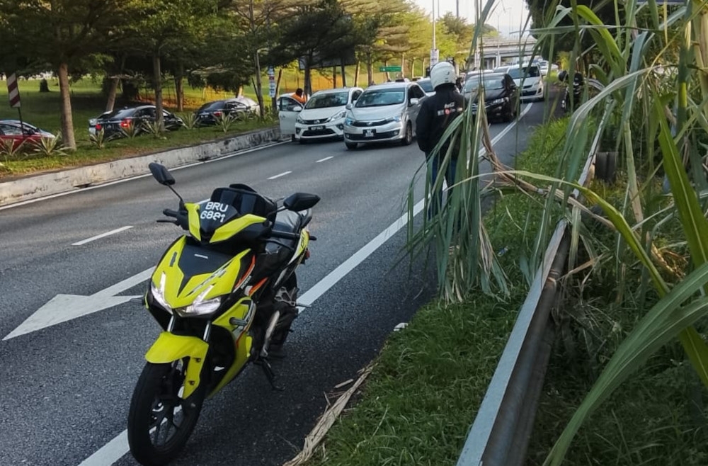 Media reports had earlier stated that one man died and another was injured after being shot by two suspects riding a motorcycle in the incident on Jalan Rasah-Mambau heading to the Port Dickson Toll Plaza. — Picture from Facebook/Adam Wong Jr