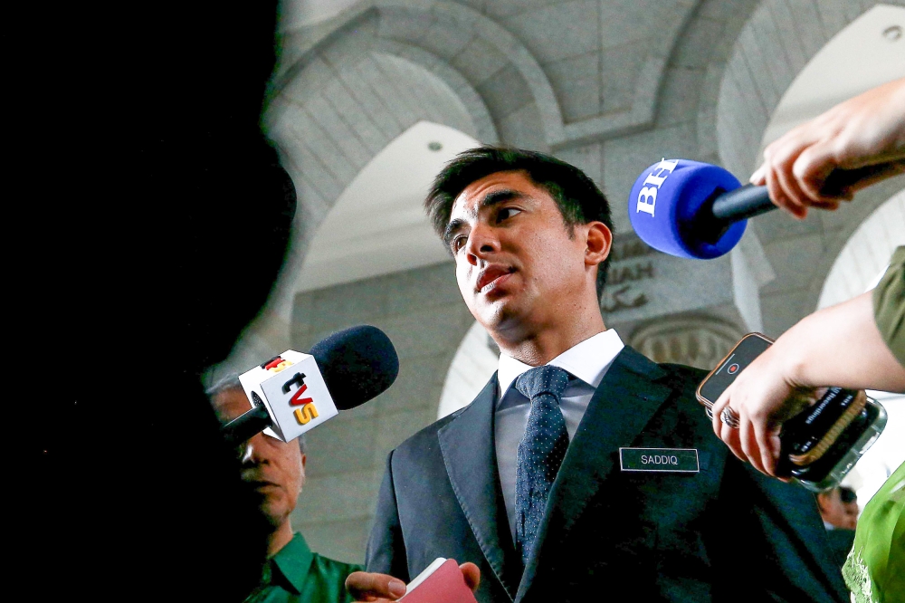 Muar MP Syed Saddiq Syed Abd Rahman speaks to the press at the Palace of Justice in Putrajaya on June 25, 2025. — Sayuti Zanudin pic