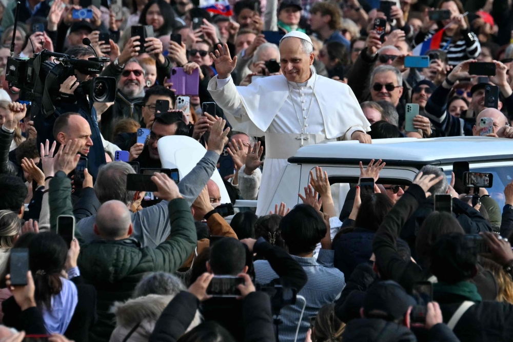 Pope Leo has set a more guarded and formal tone than the charismatic Francis but is equally unafraid to speak his mind. — AFP pic