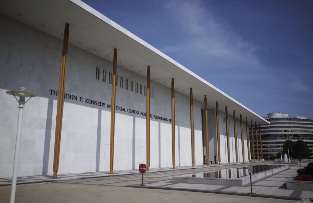 Pedestrians walk up a sidewalk to the John F. Kennedy Center for the Performing Arts on August 16, 2014 in Washington, DC. — AFP pic 