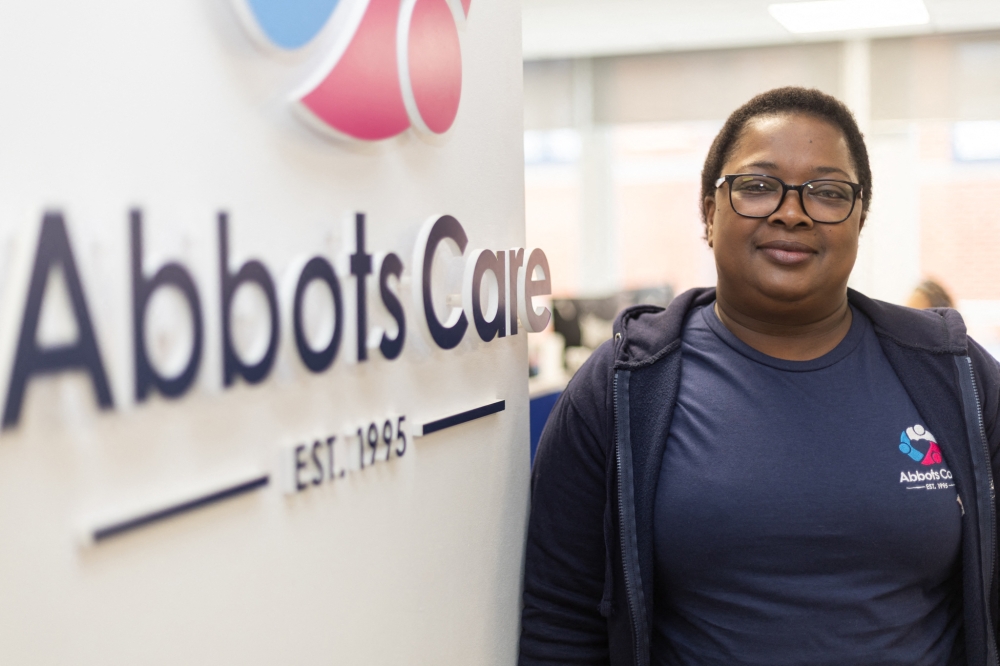 Judith Munyonga, 44, from Zimbabwe works from 7.00pm to 7.00am four days a week, caring for patients with spinal cord injuries in Hertfordshire, north of London. — AFP pic