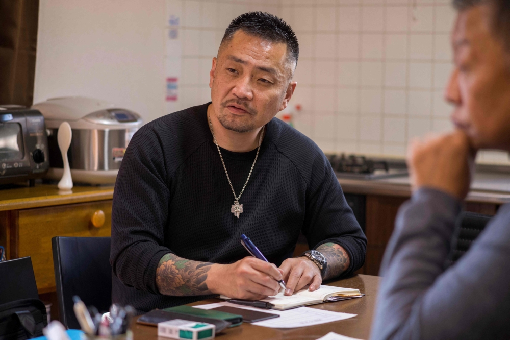 Once part of Japan’s underworld, Yoshiro Nishino — seen here on November 7, 2025 — now manages a home for ex‑offenders in Chiba. — AFP pic