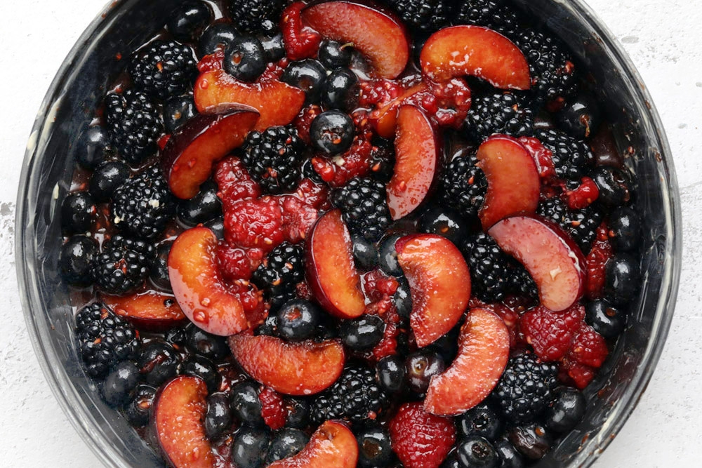 Mix the fruits with sugar. — Picture by CK Lim