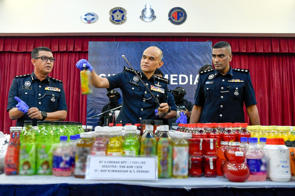 Selangor police chief Datuk Shazeli Kahar with the seized drugs at the Selangor police contingent headquarters in Shah Alam, December 15, 2025. — Bernama pic 