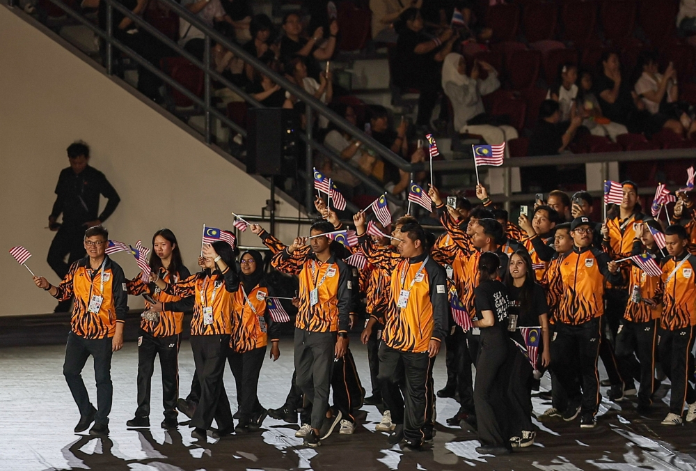 The Malaysian contingent enters the Rajamangala National Stadium for the 33rd SEA Games Thailand closing ceremony in Bangkok December 20, 2025. — Bangkok
