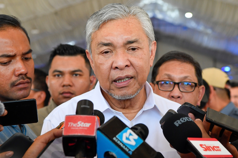 Barisan Nasional chairman Datuk Seri Ahmad Zahid Hamidi said the coalition will push to reintroduce the GST after GE16 but will accept the SST system for now. — Bernama pic