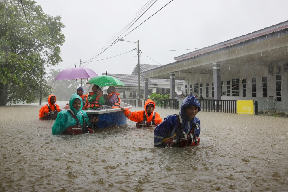 Civil Defence says personnel are ready for a possible second flood wave. — Bernama pic