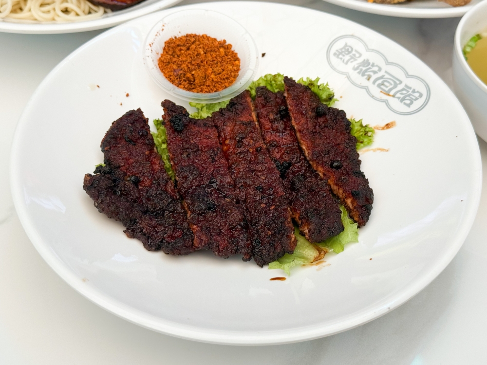 Five-spice Pork Chop won us over with its tender bite, liberally coated with spices and a fragrant chilli powder. — Picture by Lee Khang Yi