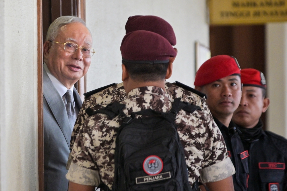 Former prime minister Datuk Seri Najib Razak is seen at the Kuala Lumpur Court Complex on December 22, 2025 as the High Court decides on his bid to serve the remainder of his sentence under home detention. — Bernama pic