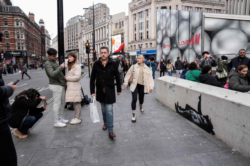 Banksy unveils new London mural amid speculation over second artwork